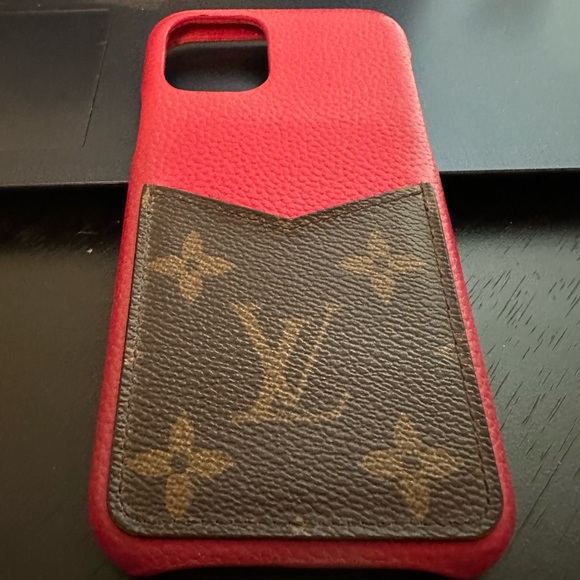 Louis Vuitton iPhone 11 Pro phone case with monogram canvas card holder.